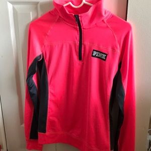 Pink pull over with partial zipper
